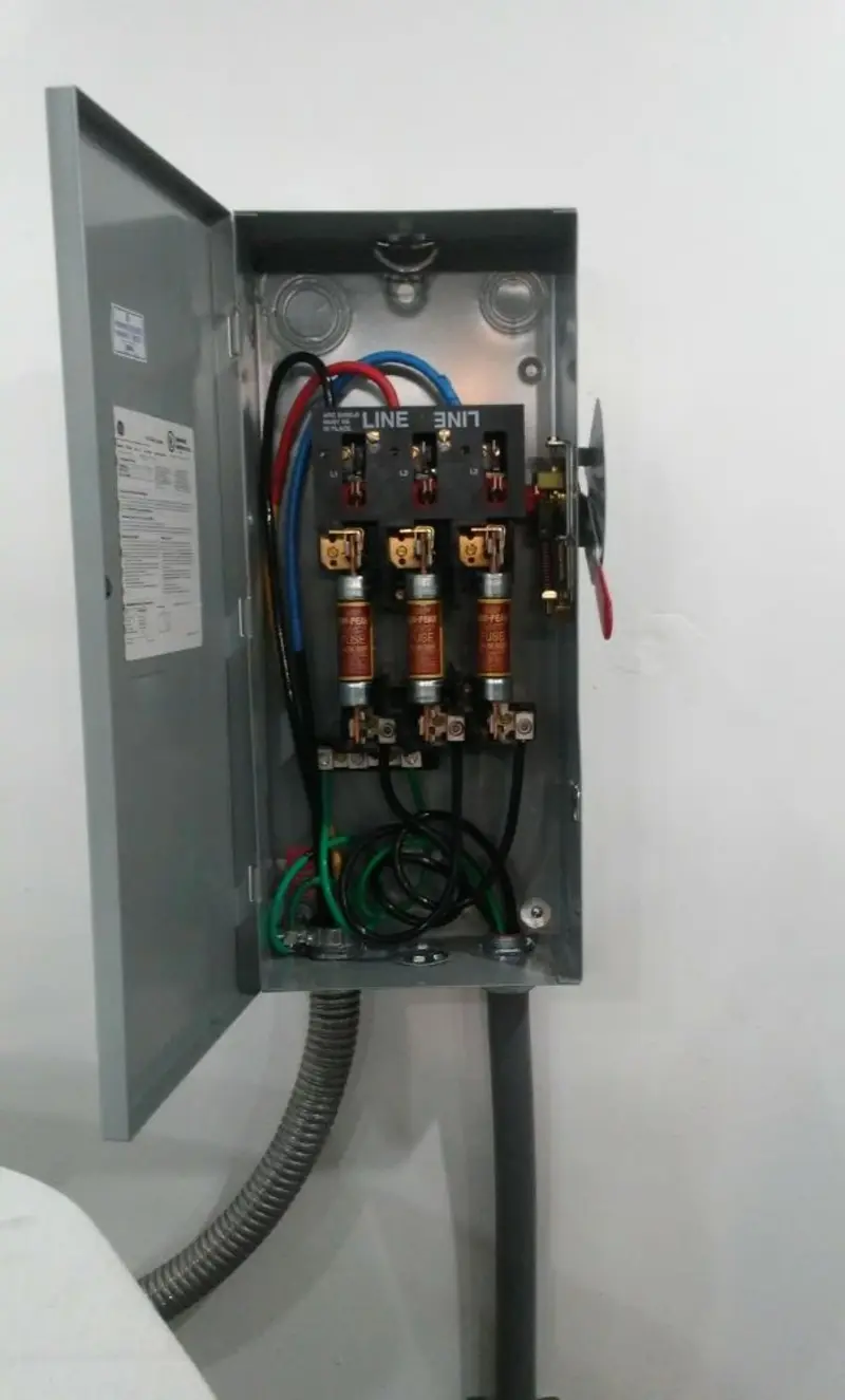 Three-phase disconnect switch installed for Smoke Detector Installation in Pennfield