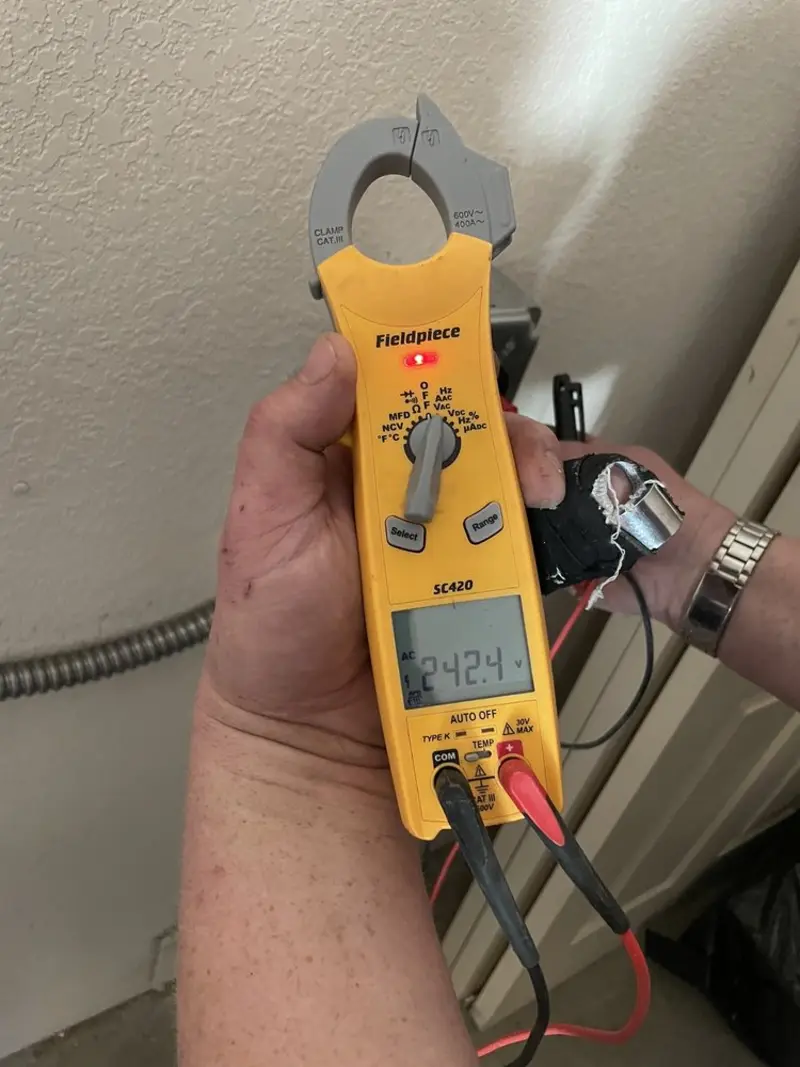 Voltage testing with clamp meter during Aluminum Wiring Replacement in Pennfield